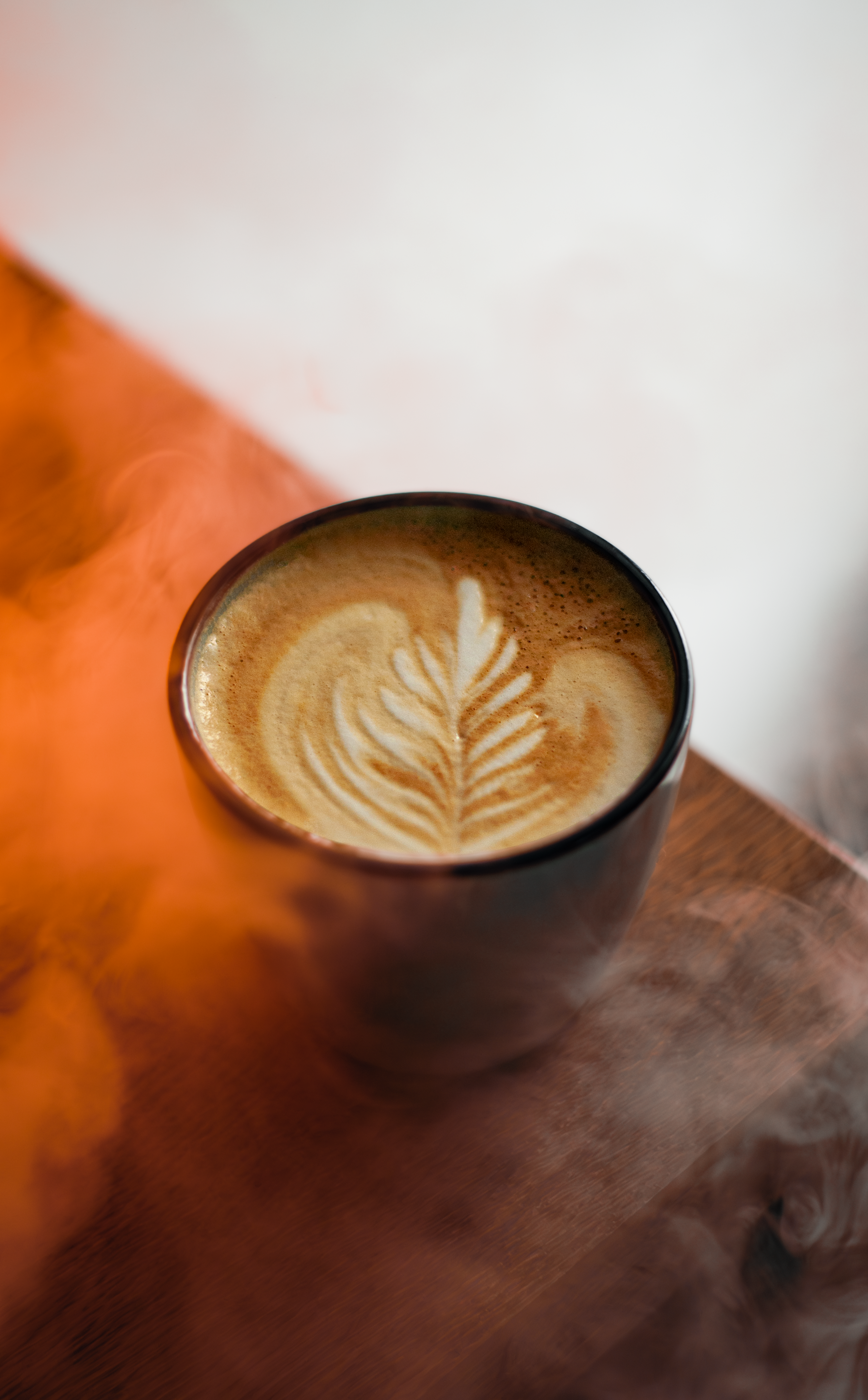 A smoky rosetta latte art.